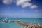 Pier and boat in ocean