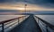 Pier And Cloudy Sunset