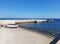 Pier on the coastline of Mediterranean Sea in Barcelona, Spain