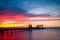 Pier and colorful ocean sunset