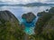 Pier in Coron, Palawan, Philippines. Coron in Background. Tour A.