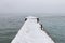 Pier covered with snow