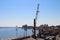 Pier, crane, buildings on the waterfront and the Mediterranean sea. Famagusta . Cyprus