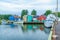 Pier, fishing boats and colorful houses, Kensington, PEI