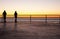 Pier fishing at sunset