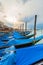 Pier gondolas near Piazza San Marco in Venice at sunrise.