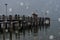 Pier on Herrenchiemsee with blowing snow