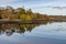 Pier house, Forest , trees reflection and Lake in Strangford lough at sunset