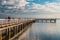 A pier leading towards the horizon