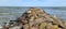 A pier made of large stones in the Baltic Sea