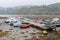 Pier with moored boats in Plockton, Scotland