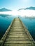 Pier by mountain lake Mondsee in Autria