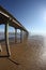 Pier in mud at low tide