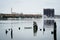 Pier pilings and waterfront buildings in Canton, Baltimore, Mary