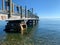 Pier rising above the waters of the Atlantic Ocean in northern Maine