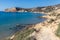 Pier, Sand and cliffs in Agios Sostis Beach