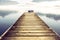 Pier with seagulls by mountain lake Mondsee in Autria