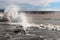 Pier seascape with splashing wave