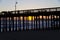 Pier with setting sun