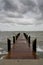 Pier on a Stormy Afternoon - Vertical