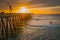 Pier that stretches toward the setting sun, panorama. An iconic California wooden pier at 1, 370 feet long in the heart of Pismo B