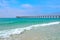 Pier stretching out over Gulf of Mexico waters