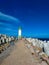 Pier to the lighthouse. Wave breaking constructions. One of the Baltic sea ports. Lighthouse in Ventspils, Latvia.