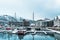 Pier and traditional and new modern buildings in marina of Tromso, Norway, Scandic hotel in the background