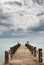 Pier under Dark Clouds