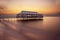 Pier in the water in the early morning at dawn. Long exposure. Odessa.