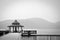 Pier and waterfront pavilion, photo in black and white color style monochrome, copy space, loneliness concept, sun moon lake