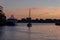 Pier waterfront view to the harbor at sunset. Boats docked at Chelsea Piers along the Hudson River in Manhattan