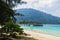 Pier on the white sand beach at Pulau Perhentian, Malaysia.