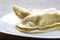 Pierogi, pyrohy or dumplings, filled with meat and onion or mus