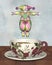 Pierrot Clown Doll Jumping into a Tea Cup