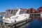 On the piers in the port of Halden (cabin cruiser)