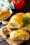 Pies with mushrooms and rice close-yp on the kitchen wooden table. Traditional Russian cuisine