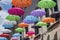 Pietrasanta, Lucca: the main street with colorful umbrellas