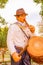 PIFO, ECUADOR - NOVEMBER, 13, 2017: Close up of beautiful stoned sculpture of a man playing some musical instruments in