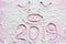 Pig and 2019 year. Cute pig face drawn on flour or snow and 2019