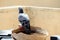 Pigeon sitting on a broken water pot