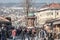 Pigeons flying over the Bascarsija square Sebilj fountain. Bascarsija is the symbol of Sarajevo, with its oriental architecture