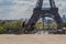 Pigeons on the ledge in front of Eiffel Tower