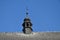 Pigeons on the roof of the church tower