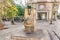 Pigeons sit on the bowl of a drinking Font de la Granota fountain in Barcelona