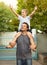Piggy back, dad and son in backyard, cute bonding together with care and love outside home. Outdoor fun, support and