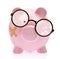 Piggy bank with broken eyeglasses