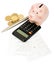 Piggy bank with calculator and coins