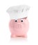 Piggy bank with a chef hat
