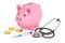 Piggy bank with coins, stethoscope and thermometer, 3D rendering